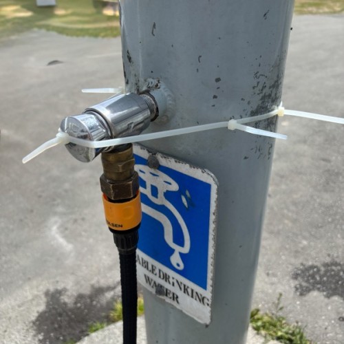 We used Electrical ties to hold the tap on.